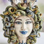 Medusa head, wisteria lustre, hair of snakes. Sicilian ceramics from Caltagirone, Sofia
