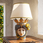 Head-shaped lamp with lemons, woman, blue and orange. Sicilian ceramics from Caltagirone, Sofia