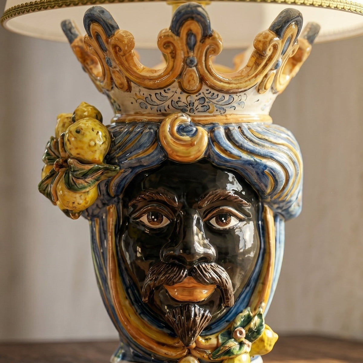 Head lamp with Lemons, Moor male, blue and orange. Sicilian ceramics from Caltagirone, Sofia