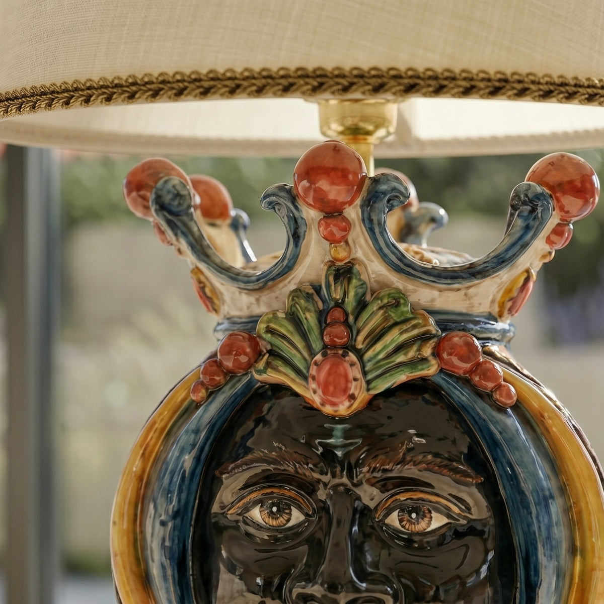 Head-shaped lamp, Moor male, blue and orange. Sicilian ceramics from Caltagirone, Sofia
