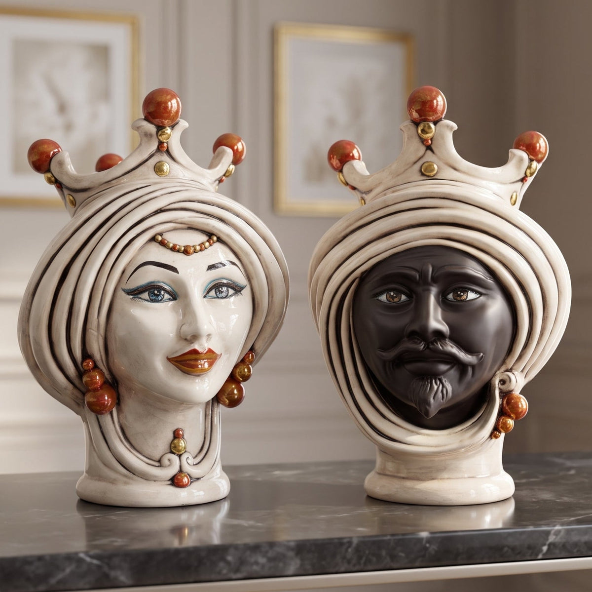 Pair of Teste di Moro with beads, woman and man with a matt dark face, on a marble top