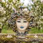 30 cm Medusa head with flowers among the snakes and blue lips, coloured mother of pearl, among blossoming trees