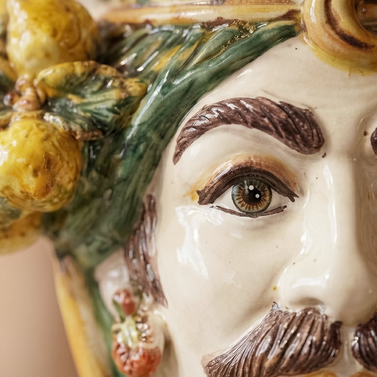 Testa di Moro with lemons, white male, green and orange, crown. Ceramiche Sofia, Caltagirone