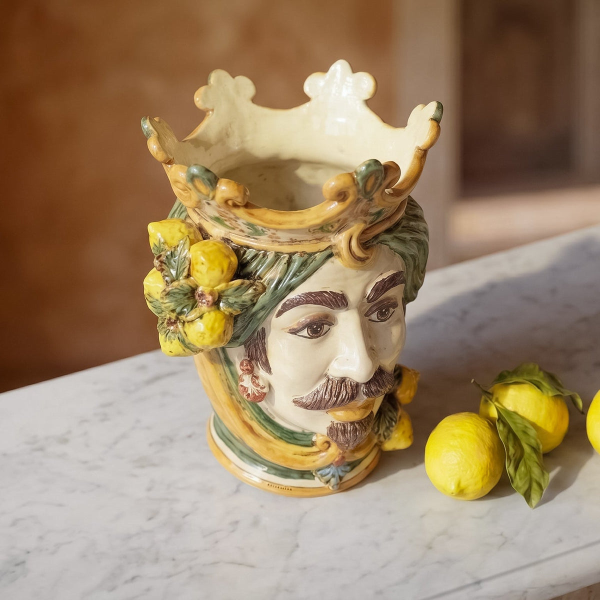 Testa di Moro with lemons, white male, green and orange, crown. Ceramiche Sofia, Caltagirone
