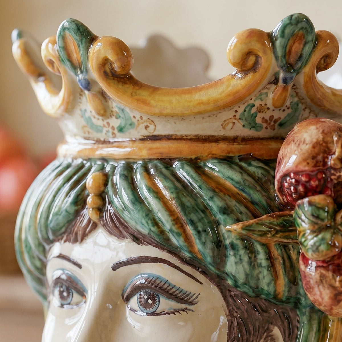 Testa di Moro with pomegranates, woman, green and orange, crown. Ceramiche Sofia, Caltagirone
