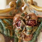 Testa di Moro with pomegranates, woman, green and orange, crown. Ceramiche Sofia, Caltagirone