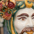 Testa di Moro with Pomegranates, white male, green and orange. Sicilian ceramics from Caltagirone, Sofia