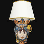 Head-shaped lamp with lemons, woman, blue and orange. Sicilian ceramics from Caltagirone, Sofia