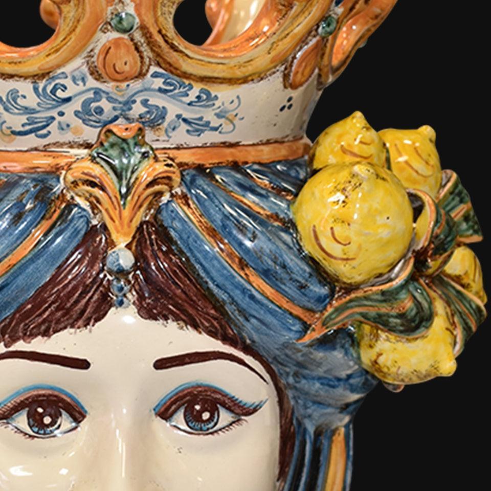 Head-shaped lamp with lemons, woman, blue and orange. Sicilian ceramics from Caltagirone, Sofia