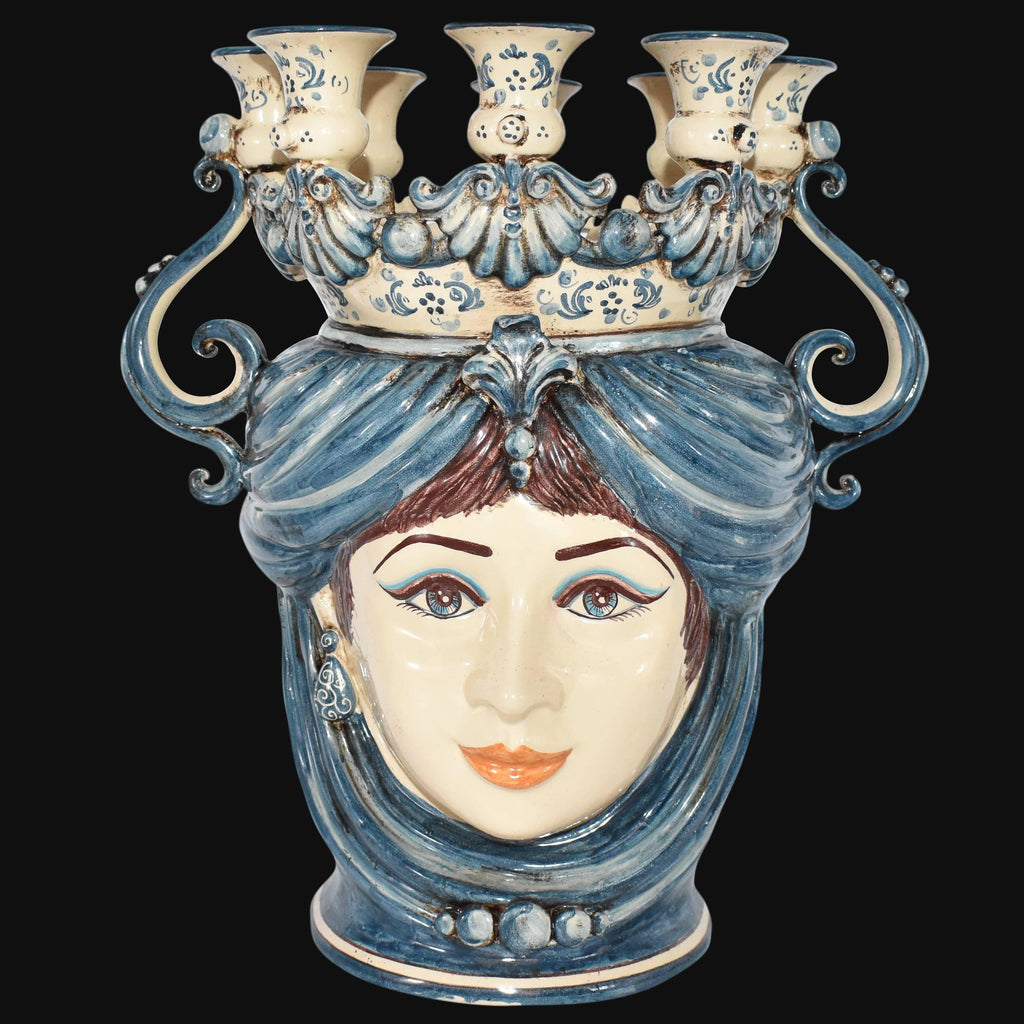 Handmade Caltagirone ceramics with female face and blue decorations, a unique handcrafted piece