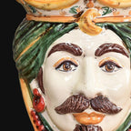 Handmade Caltagirone ceramics with a decorated face and vivid colours