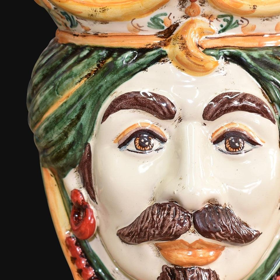 Handmade Caltagirone ceramics with a decorated face and vivid colours