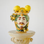 Head h 25 with green and orange lemons, white male, Ceramiche di Caltagirone Sofia