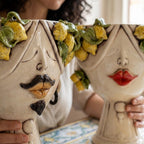 Pair of Zahira heads with lemons in mother of pearl, detail of the faces
