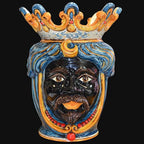 Handmade Caltagirone ceramics: royal mask with blue and gold crown, colourful details