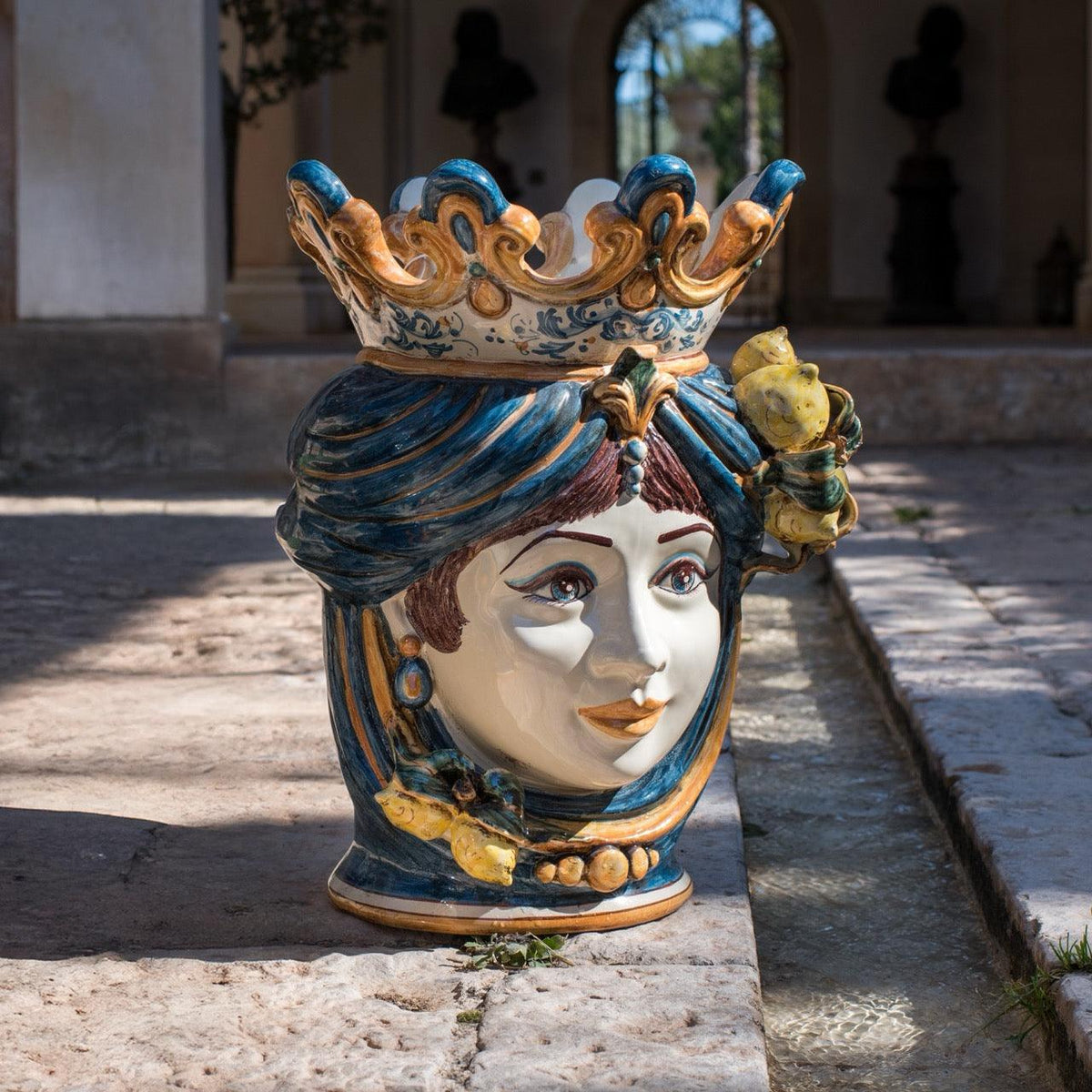 Woman's head in Caltagirone ceramics by Sofia with lemons, blue and orange, handmade ceramics.