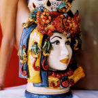 Detail of the 50 cm female Testa di Moro with turban, Decoro Sicily: relief flowers and a red bead necklace